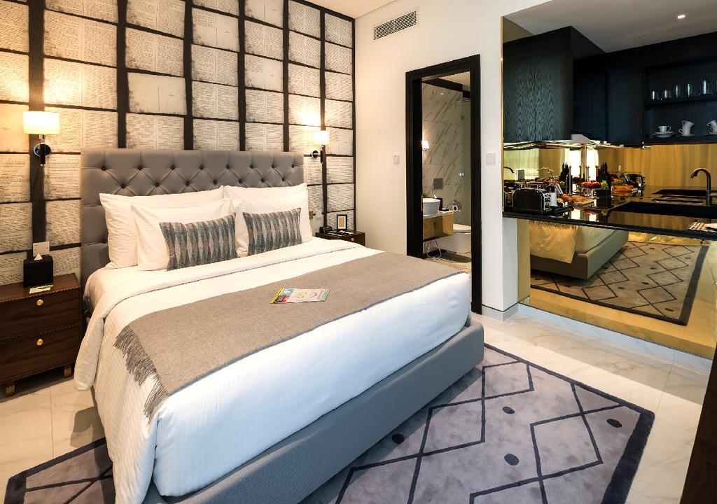 Millennium Atria Business Bay Aparthotel Dubaj Kültér fotó A bedroom at the hotel